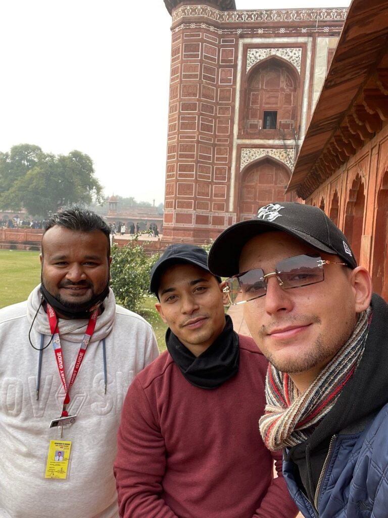 Mohd Imran Khan, experienced Agra tour guide, with international travelers at the Taj Mahal