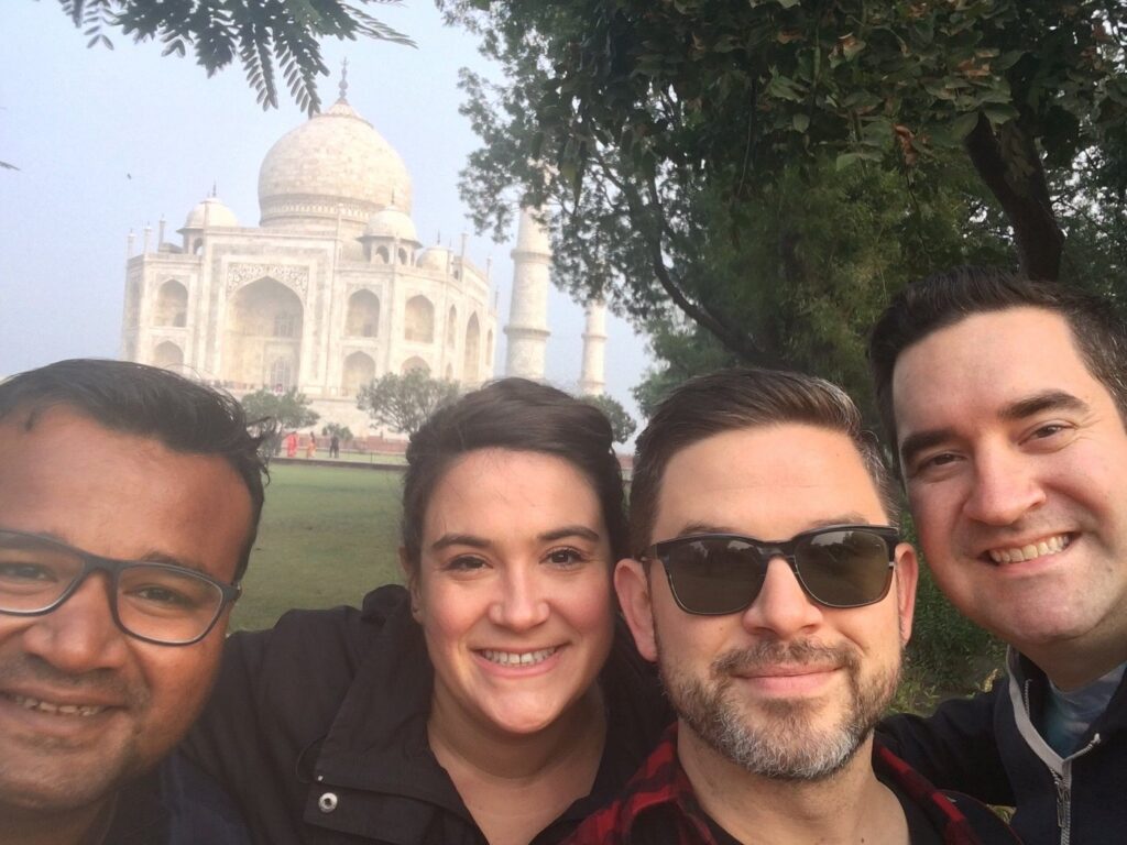 Imran Khan with international tourists during a guided tour of the Taj Mahal in Agra.