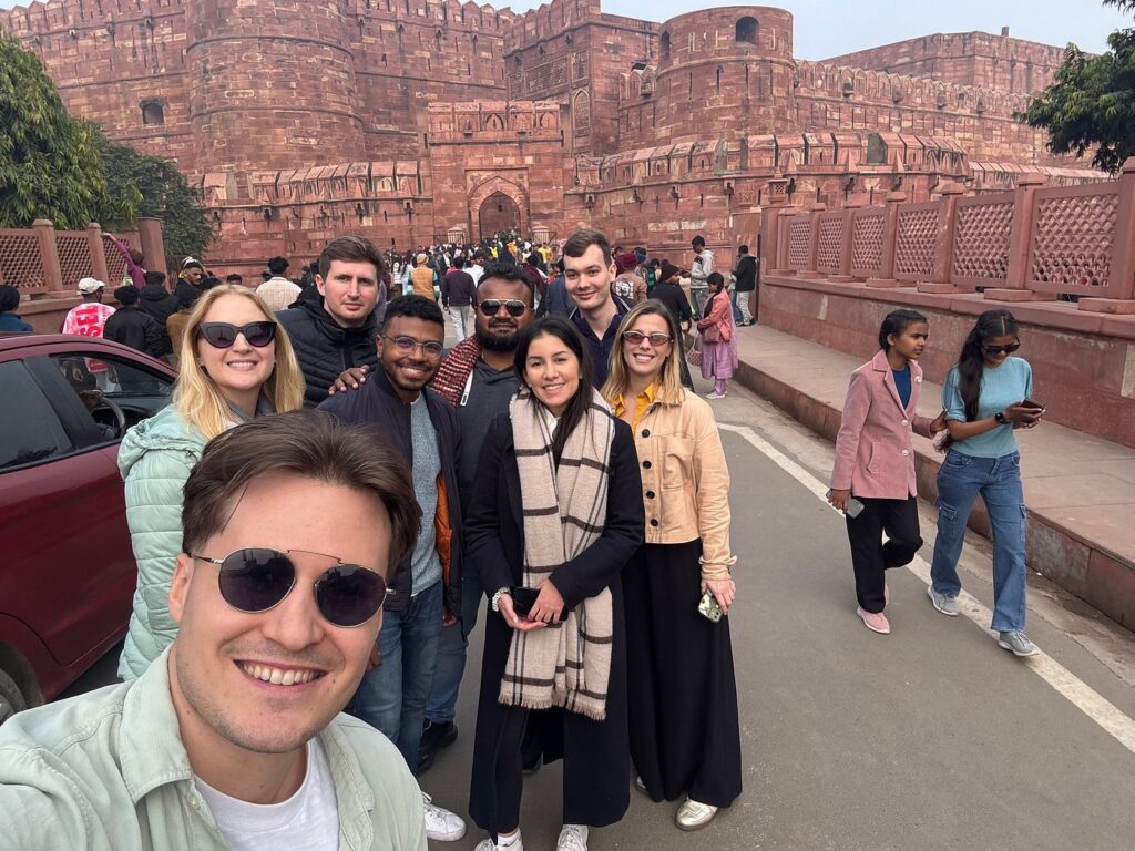 Government approved tour guide with international traveler near Agra heritage attractions