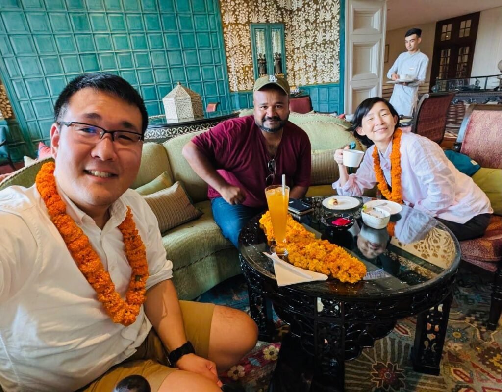 Travelers enjoying a local dining experience during their Agra trip